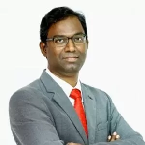 Dr Joy Varghese