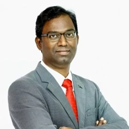 Dr Joy Varghese